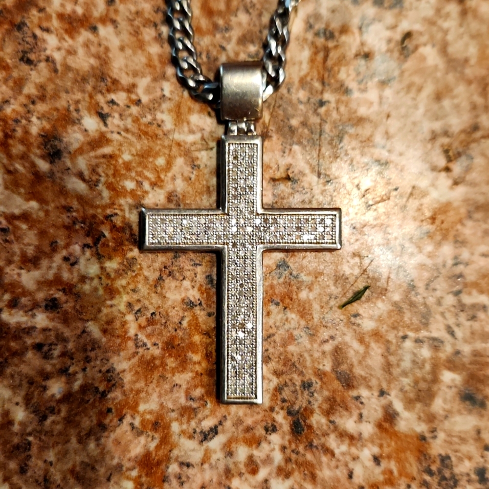 Iced cross. With steel chain